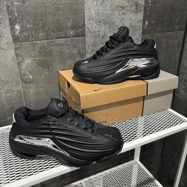Original Nike Nocta Drake Black , Metallic Silver · Photo 1