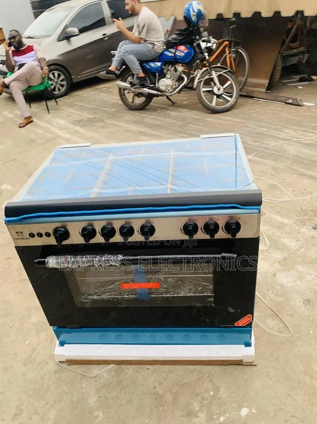 Nasco Gas Cooker 60/90 5burner Oven Rotisserie Grill Sliver. · Photo 1
