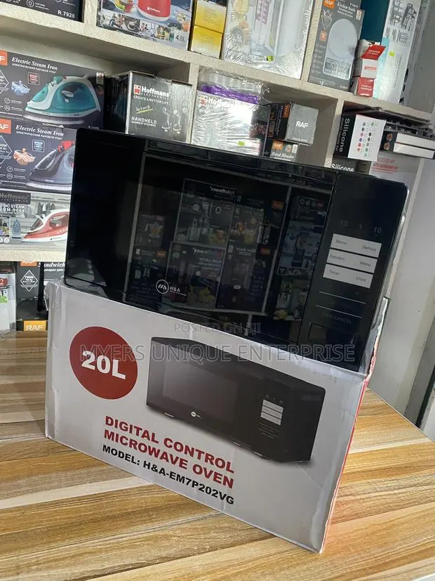 20L Digital Microwave - Defrost Reheat Function · Photo 1