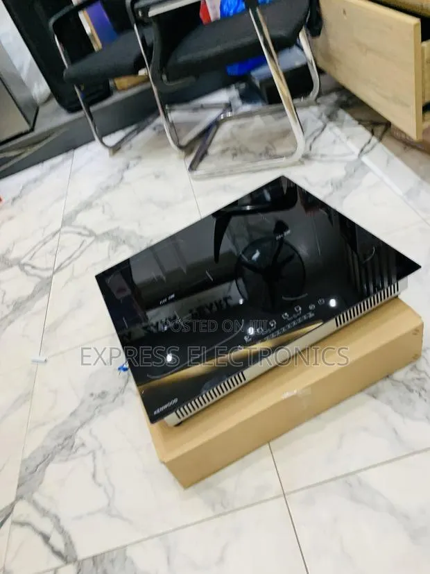 Get a New Black 4burner All Electric Kenwood Cooker Built In · Photo 1