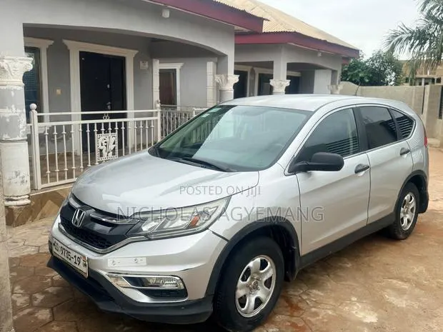 Honda CR-V LX 4dr SUV (2.4L 4cyl 5A) 2013 Silver · Photo 1