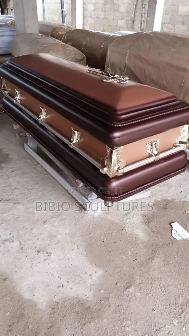 Two-Tone Brown Casket With Silver Fittings · Photo 1