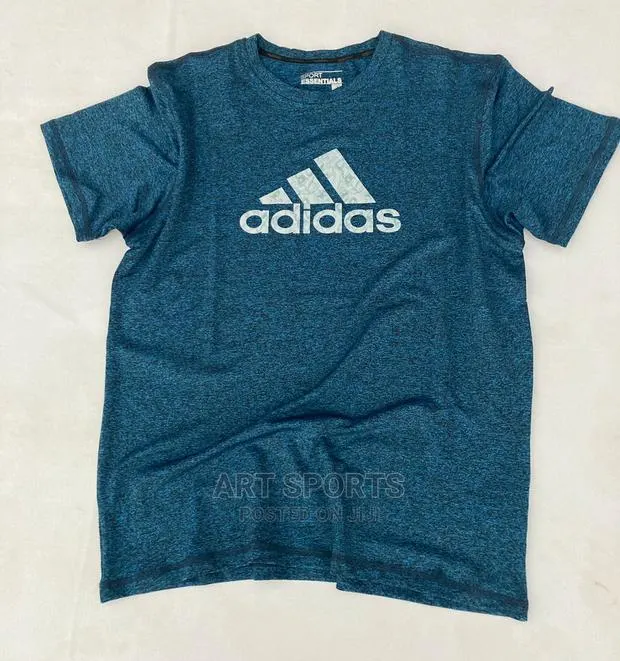 Adidas Tops · Photo 1