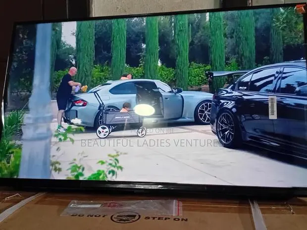 TCL 32-Inch Modern Flat Screen Television · Photo 1