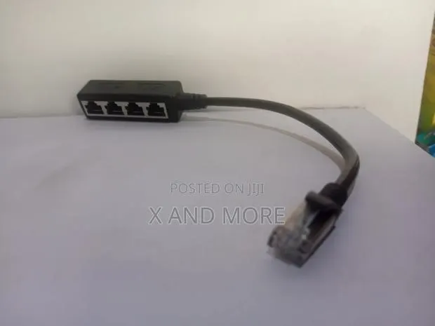 Rj45 4 in 1 Ethernet Cable Adapter Extension Splitter for Network · Photo 1