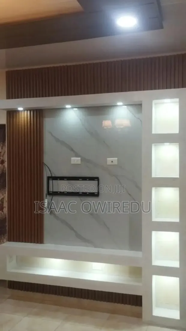 Television Wall Mounted Design With Colourful Lighting System · Photo 1