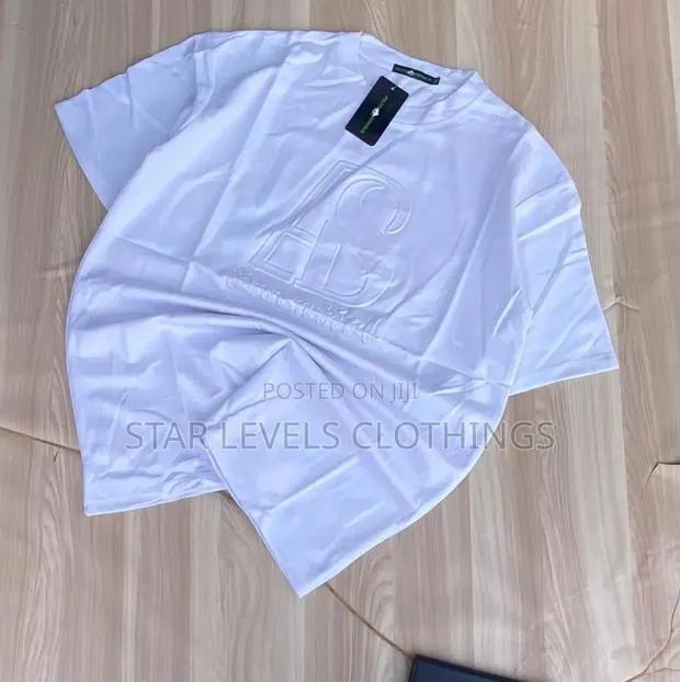 White Round Neck Shirts Available for Men · Photo 1