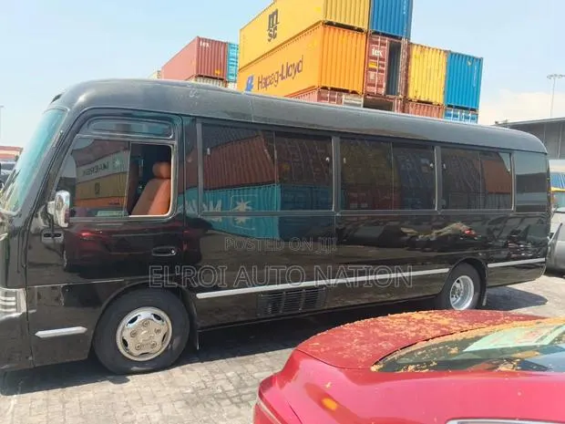 Toyota Coaster 2019 Black · Photo 1