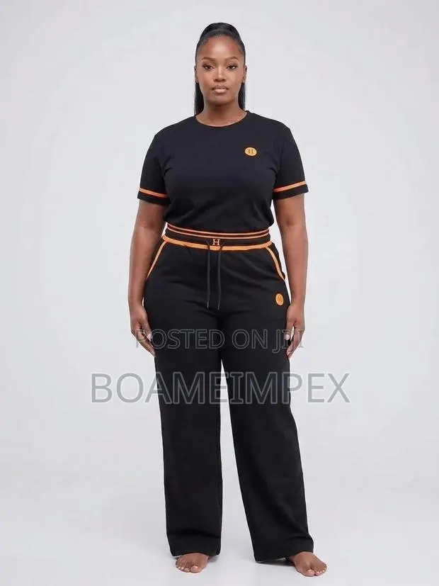 Ladies 2-Piece Black & Orange Casual Set | T-Shirt & Wide-Leg Trousers · Photo 1