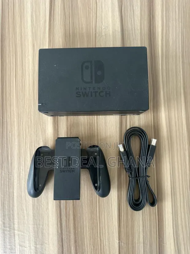 Nintendo Switch Dock With Joy Con Grip and Hdmi Cable · Photo 1