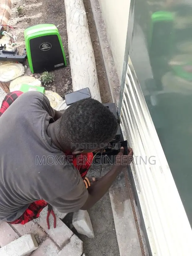 Installation of Garage Door(Panel ) and Sliding Gate Motor · Photo 1