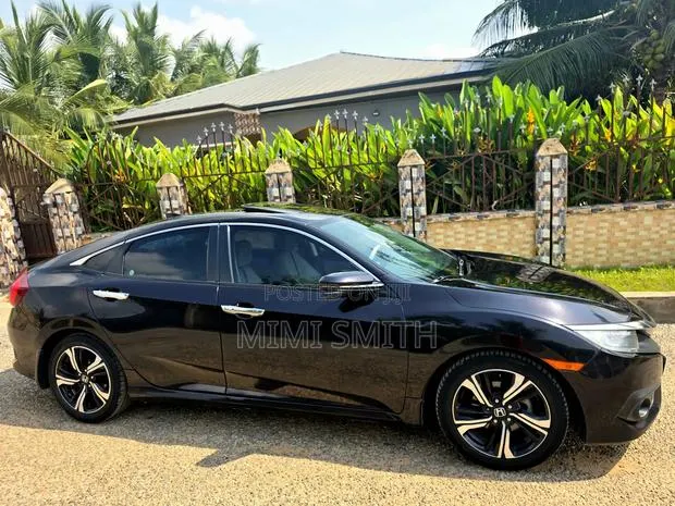 Honda Civic Touring 4dr Sedan (1.5L 4cyl) 2016 Black · Photo 1