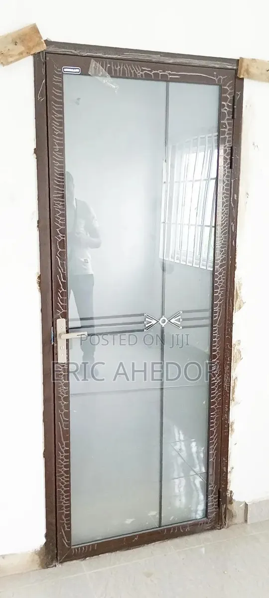 Brown Design Outside Open Glass Door and Accessories · Photo 1