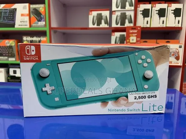 Nintendo Switch LITE Turquoise Plus 64GB SD Card · Photo 1