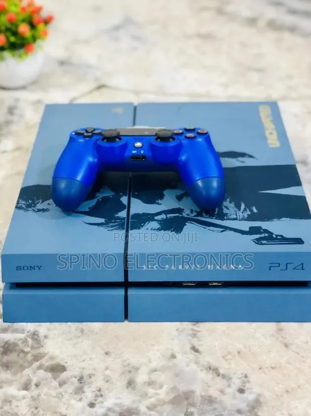 PLAYSTATION 4 With Games of Your Choice · Photo 1