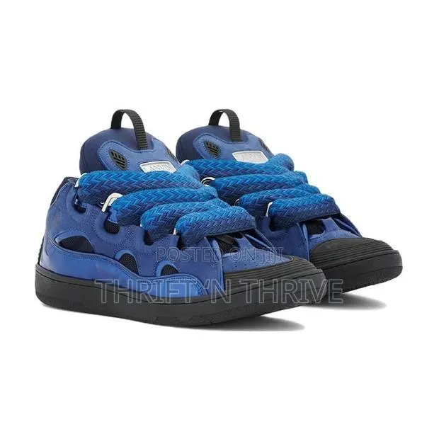 Lanvin Curb Sneakers in a Vibrant Blue Shade. · Photo 1