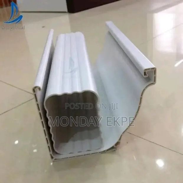 White Gutter and Pipe With Accessories · Photo 1