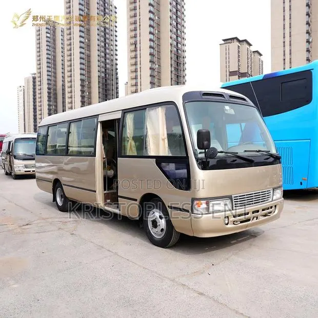 Toyota Coaster 2016 Gold · Photo 1