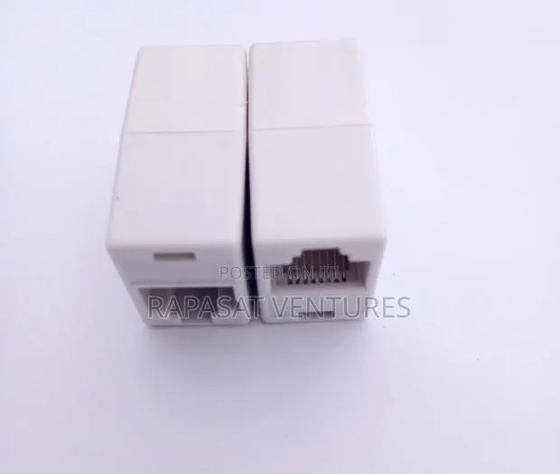 Rj45 Female to Rj45 Female Plastic Adaptor · Photo 1