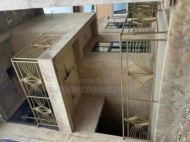 Gold Design and Glass Balustrade · Photo 1