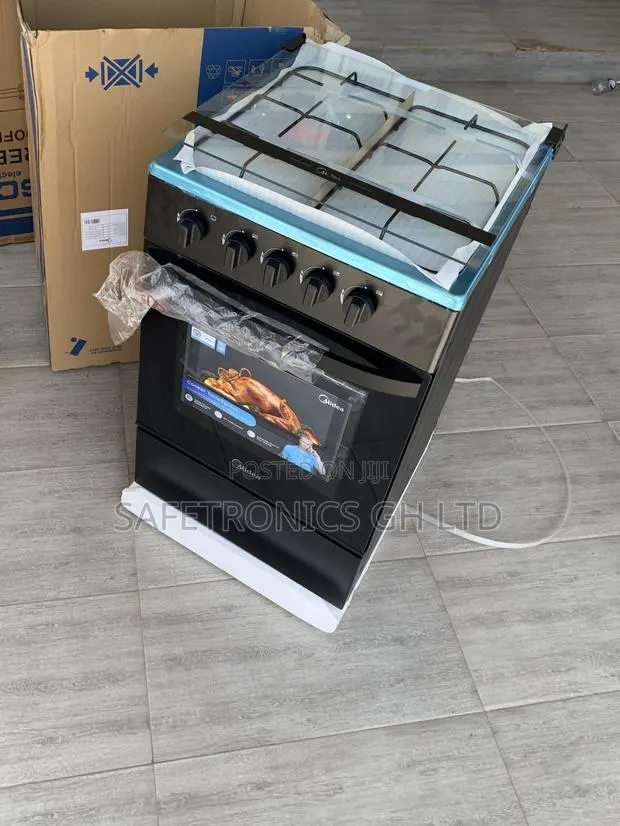 Exclusive Black Oven Grill Midea 4-Burner Gas Cooker · Photo 1