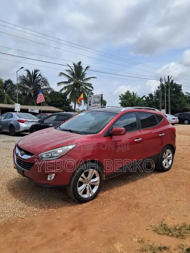 Hyundai Tucson 2015 Red · Photo 1