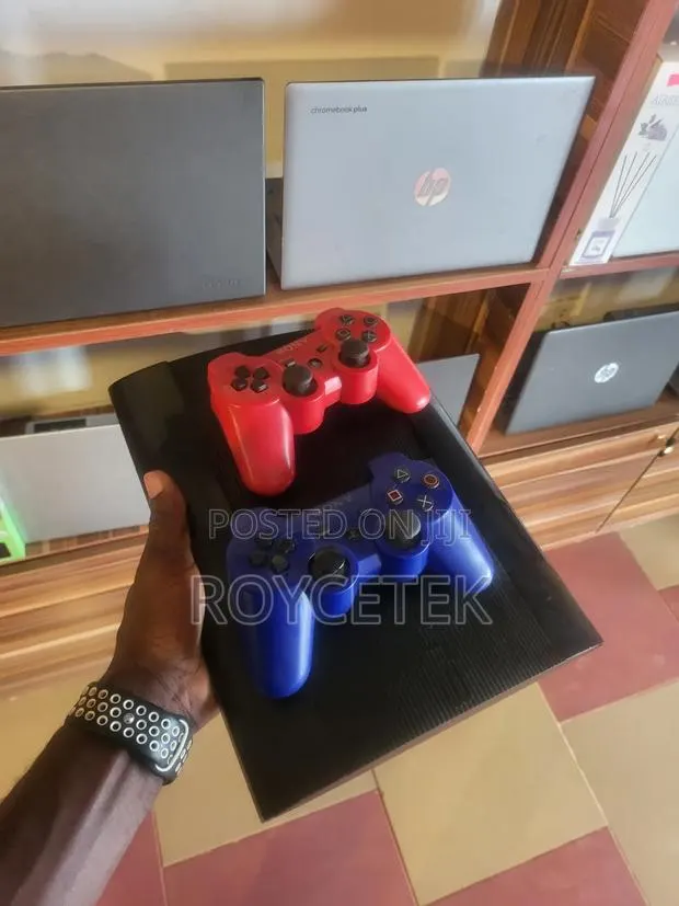Play Station 3 Slim · Photo 1