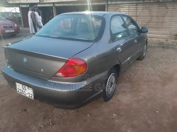 Kia Spectra 2002 Gray · Photo 1