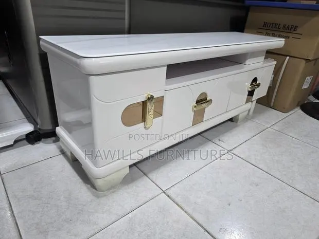 Modern Tv Stand Features Clean White Marble Finish Accented by Sleek · Photo 1