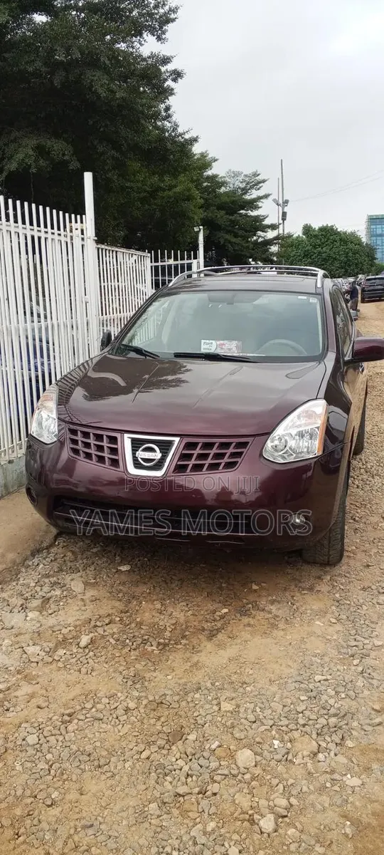 Nissan Rogue 2010 Red · Photo 1