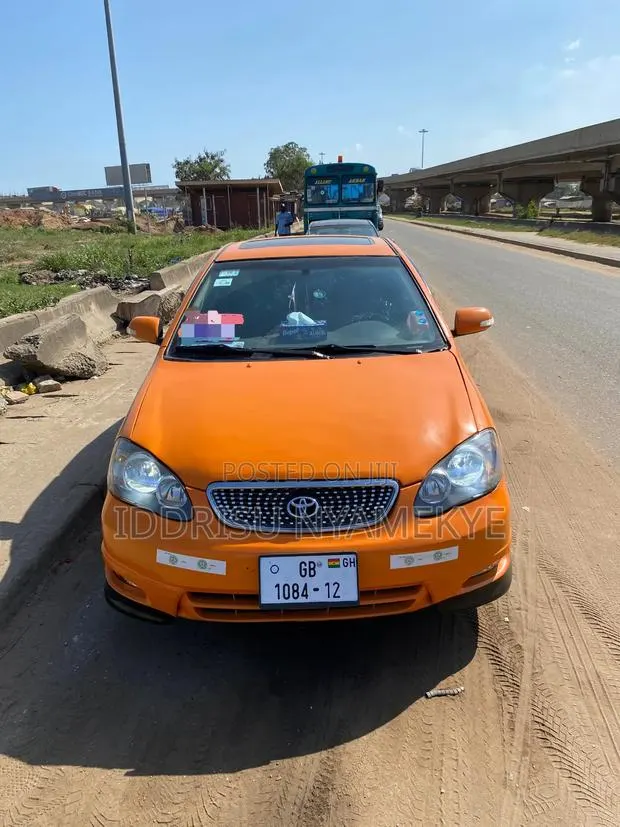 Toyota Corolla 2007 Orange · Photo 1