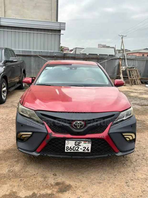 Toyota Camry SE FWD (2.5L 4cyl 8AM) 2018 Red · Photo 1