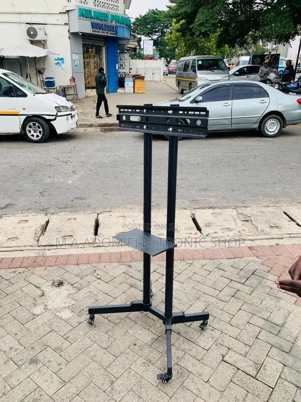 Classic Design Mobile Tv Stand With Wheels for 32”-70 Tv. · Photo 1
