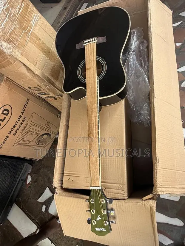 Yamaha Acoustic Guitar With A Cutaway Body Style. · Photo 3