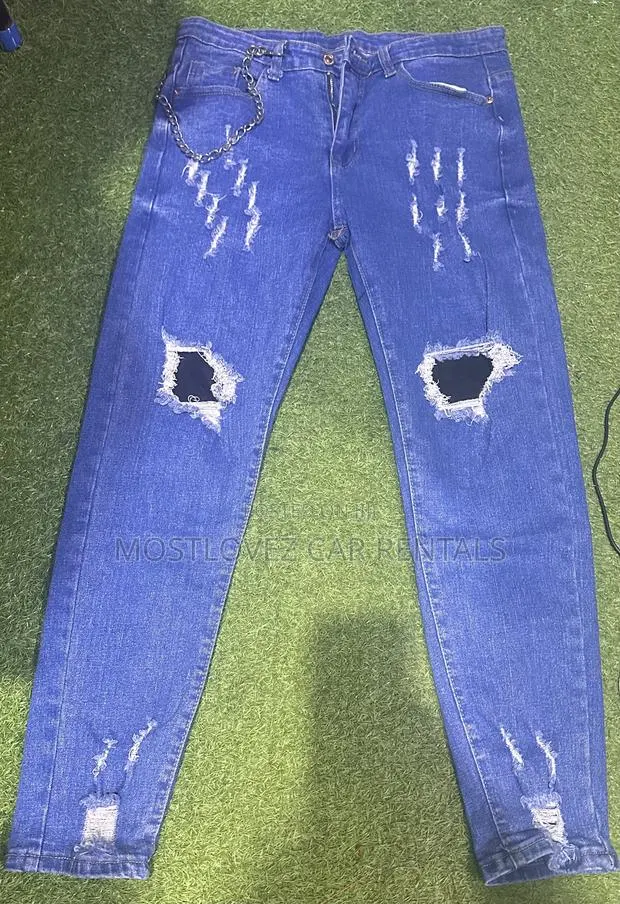 Men Jeans Ripped for Sale Blue Waist Size 33 in Store · Photo 1