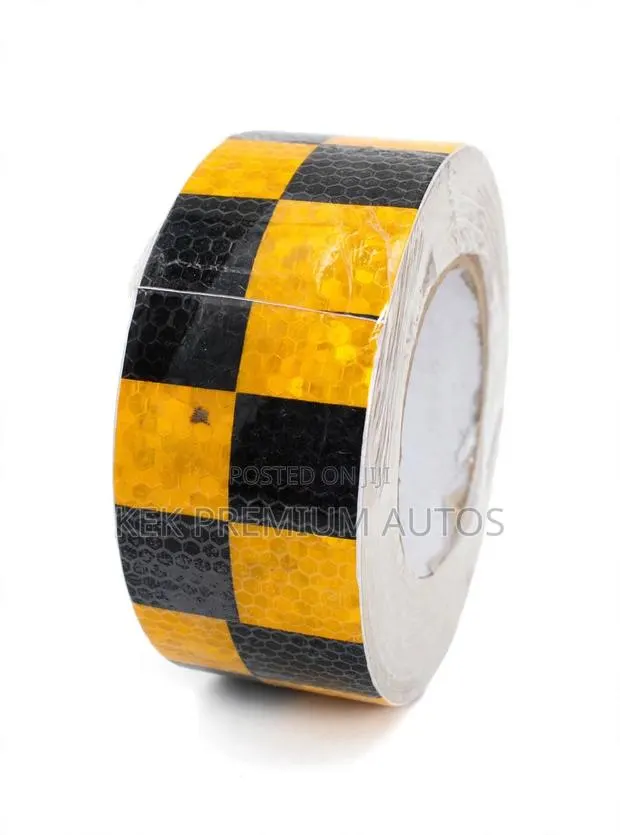 Adhesive Cauiton Tape · Photo 1