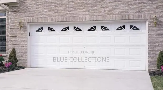 Canadian Automated Garage Door With Ark Fanlight · Photo 1