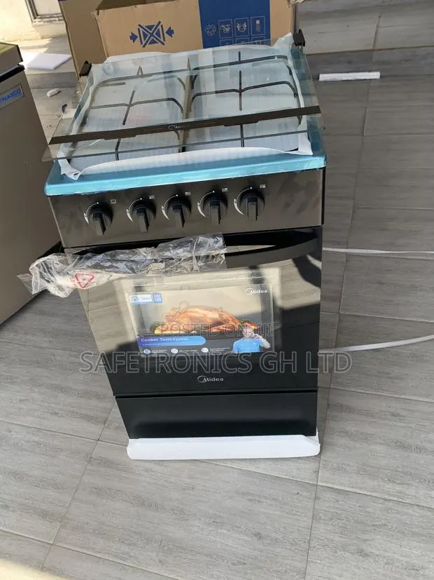 Premium Sleek Midea 4-Burner Gas Cooker Oven With Grill · Photo 1