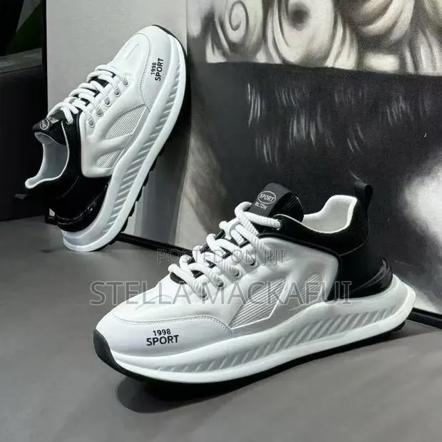 Black and White Sneakers in Sizes 42 and 43 Only · Photo 1