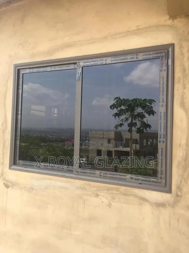 Grey Coating Italian Sliding Windows Well Installed · Photo 1