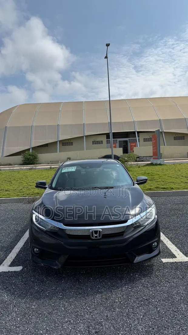 Honda Civic Touring 2dr Coupe (1.5L 4cyl) 2017 Black · Photo 1