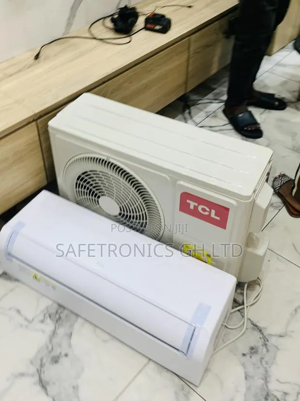 Try New TCL Ac 1.5hp R410 White · Photo 1