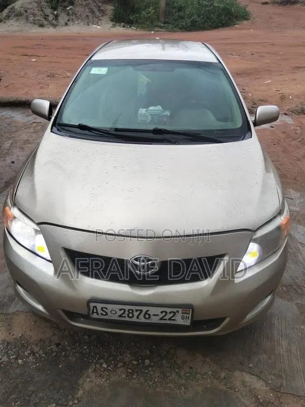 Toyota Corolla 2009 Gold · Photo 1