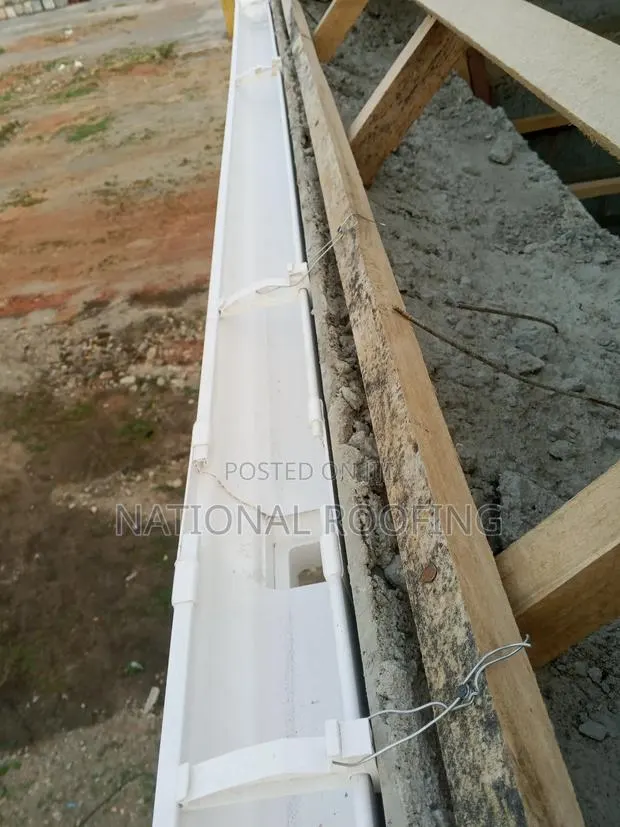Rain Gutter Installation. · Photo 1