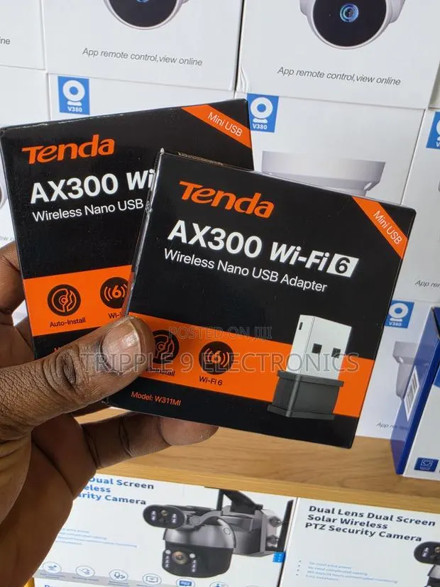 Tenda AX300 Wi-Fi 6 Wireless Nano USB Adapter (Model W311MI). · Photo 1