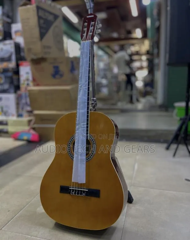 Yamaha Professional Acoustic Guitar (Brown) · Photo 1