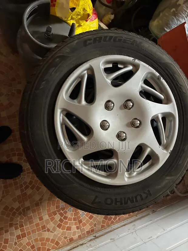 Kumho Crugen Premium Tires With 17 Inch Steel Rims With Hubcaps · Photo 1