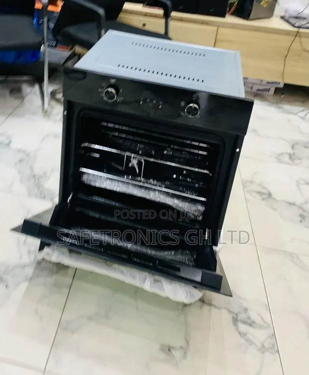 Try Massive Sleek Black Kenwood Electric and Gas Ovens · Photo 1