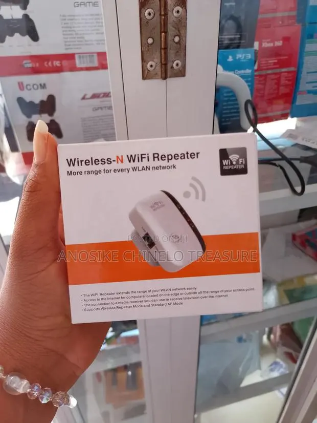 Wireless-N WiFi Repeater 300Mbps WiFi Range Extender · Photo 1