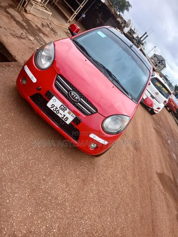 Kia Morning 2010 Red · Photo 1